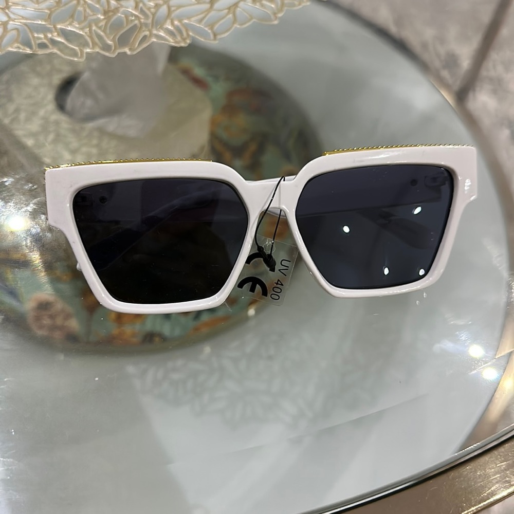 New White sunglasses with gold detailing